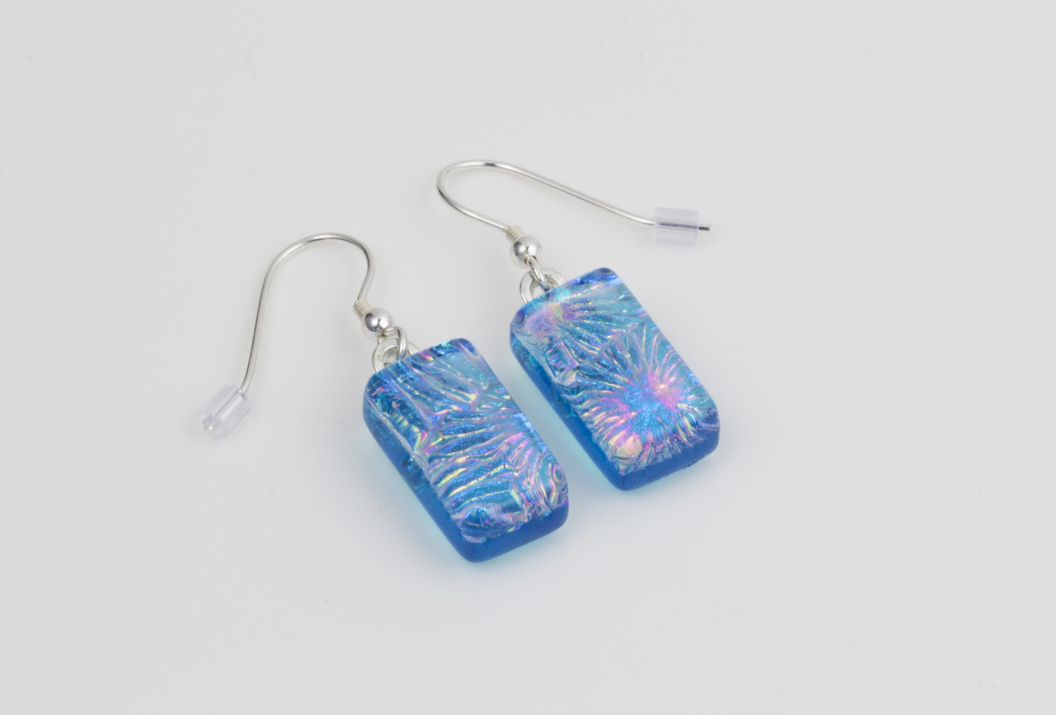 Dichroic glass jewellery, glass drop earrings, turquoise glass earrings with starburst pattern, art glass earrings, handmade in Shropshire, sterling silver hooks
