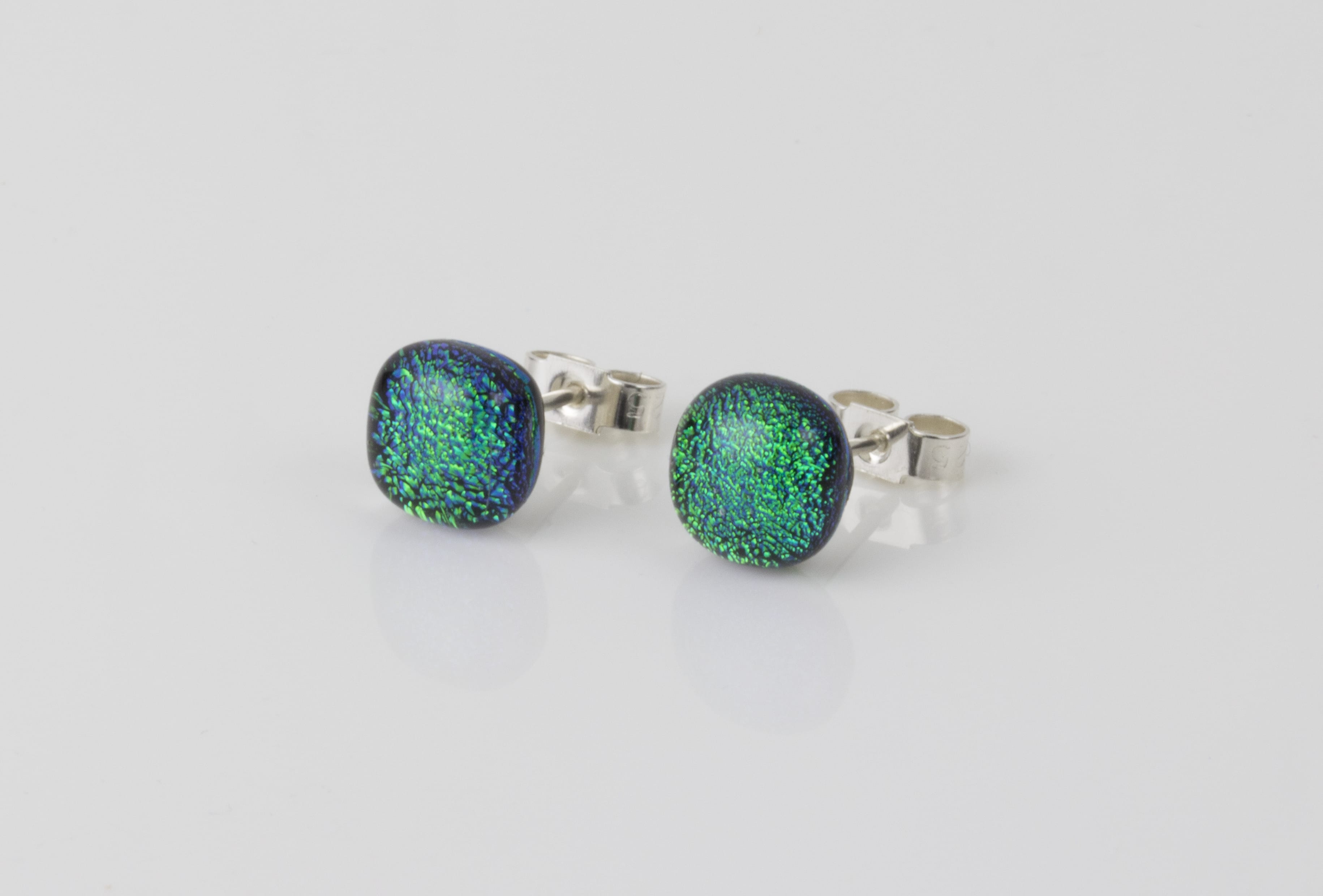 Dichroic glass jewellery uk, handmade stud earrings with emerald green dichroic glass, round, sterling glass 7-9mm, silver posts.