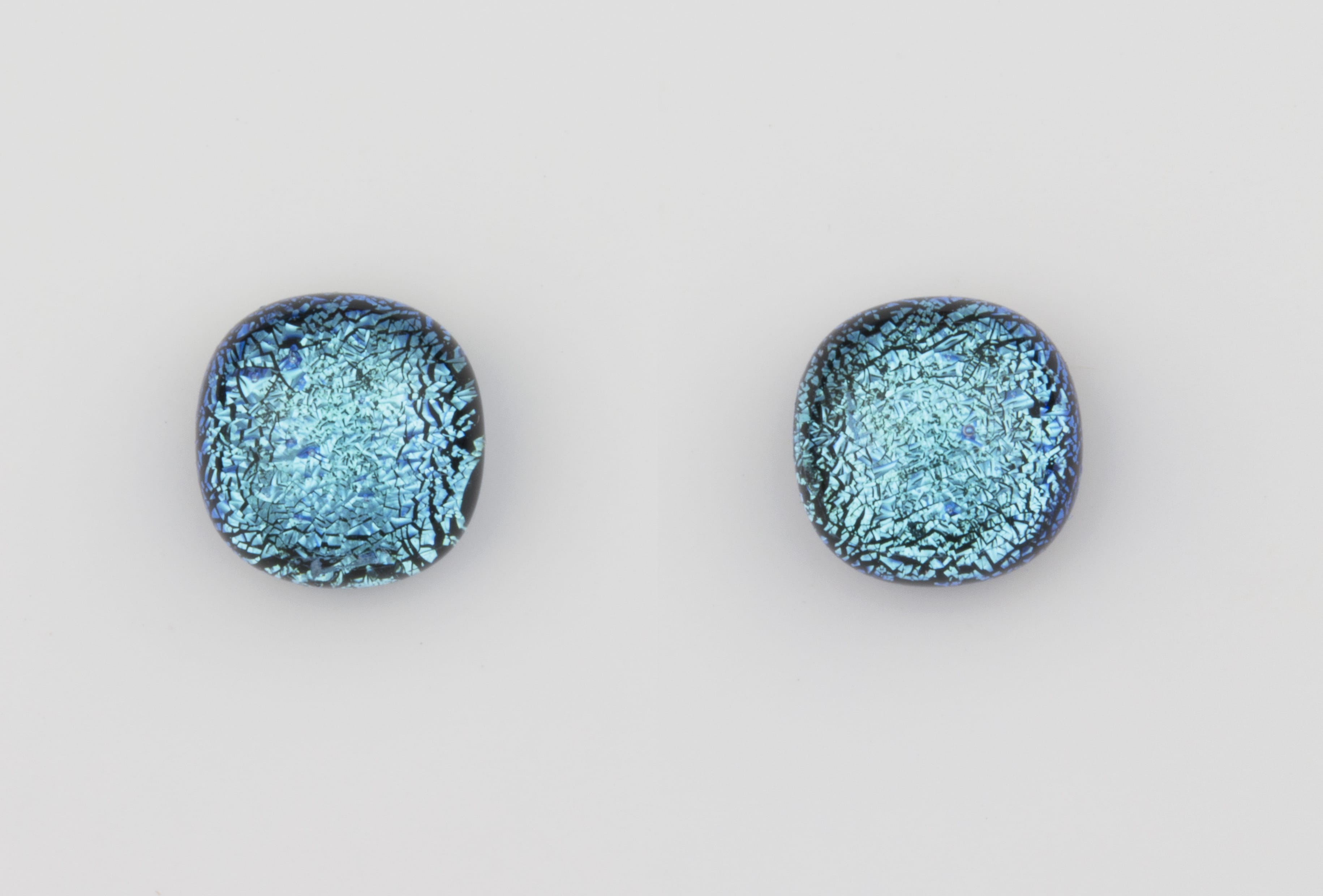 Dichroic glass jewellery uk, handmade stud earrings with pale blue dichroic glass, round, sterling glass 7-9mm, silver posts.