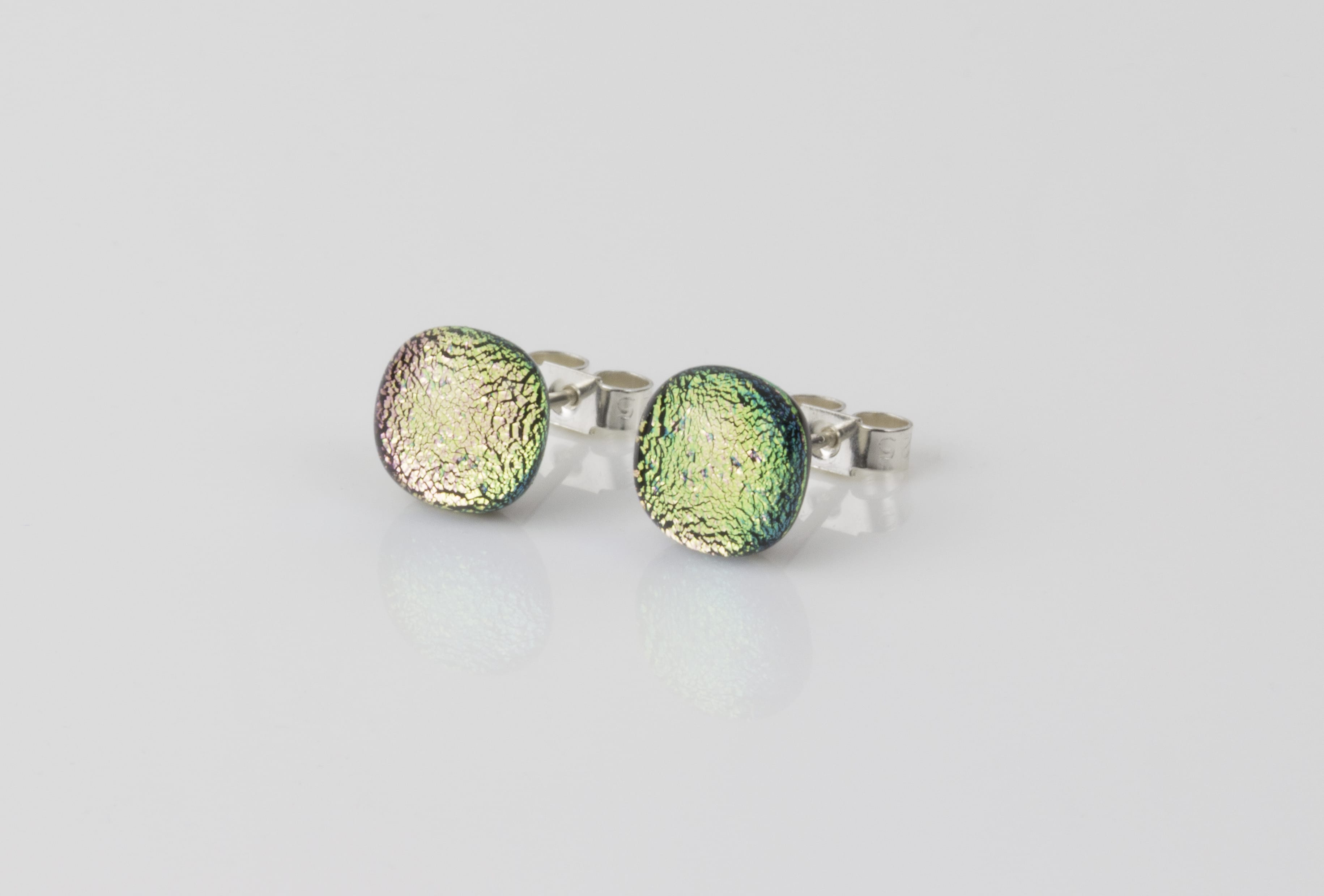 Dichroic glass jewellery uk, handmade stud earrings with pale pink dichroic glass, round, sterling glass 7-9mm, silver posts.