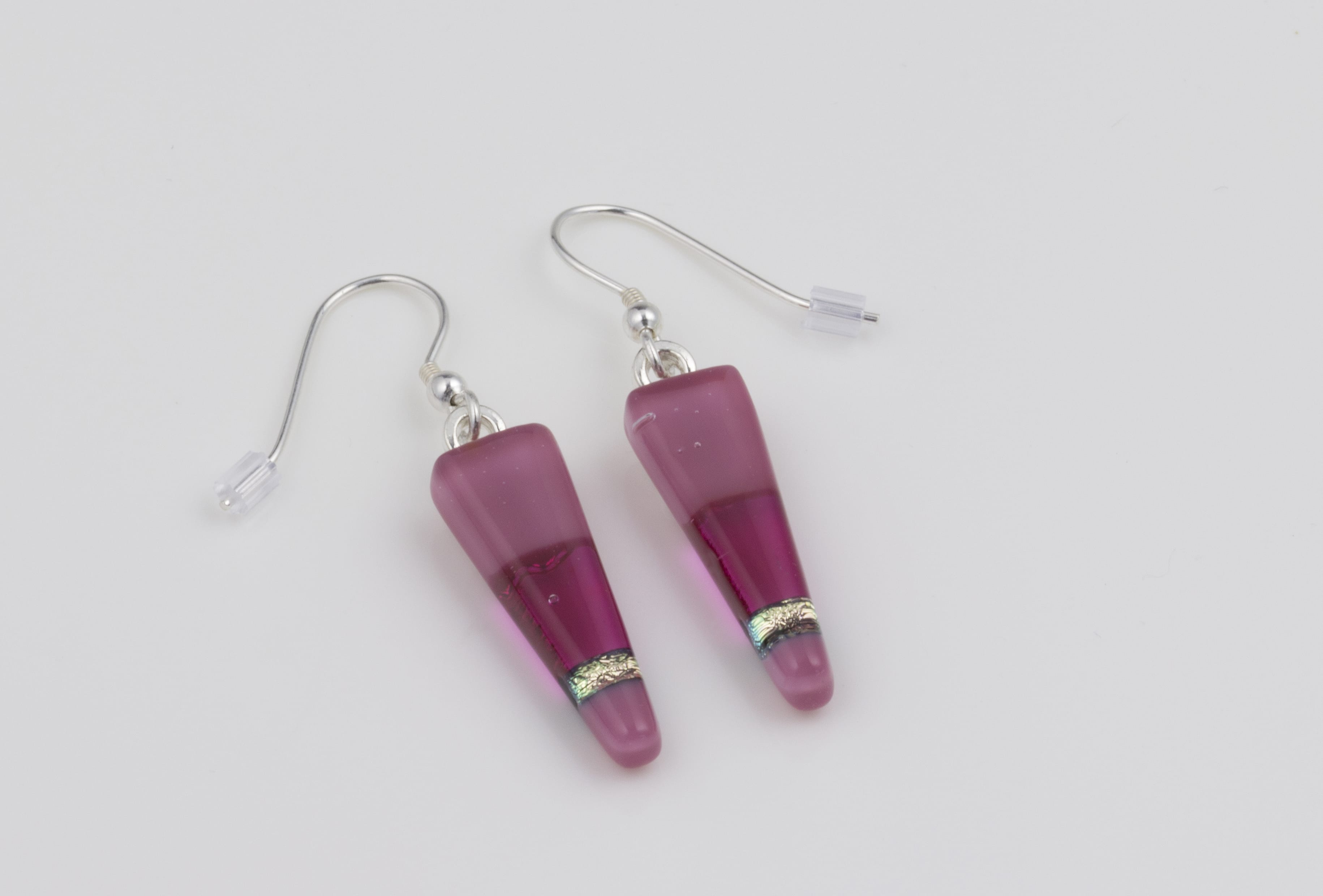 Dichroic glass jewellery, glass drop earrings, tapered pink earrings with transparent, opaque and dichroic glass, art glass earrings handmade in Shropshire, sterling silver hooks