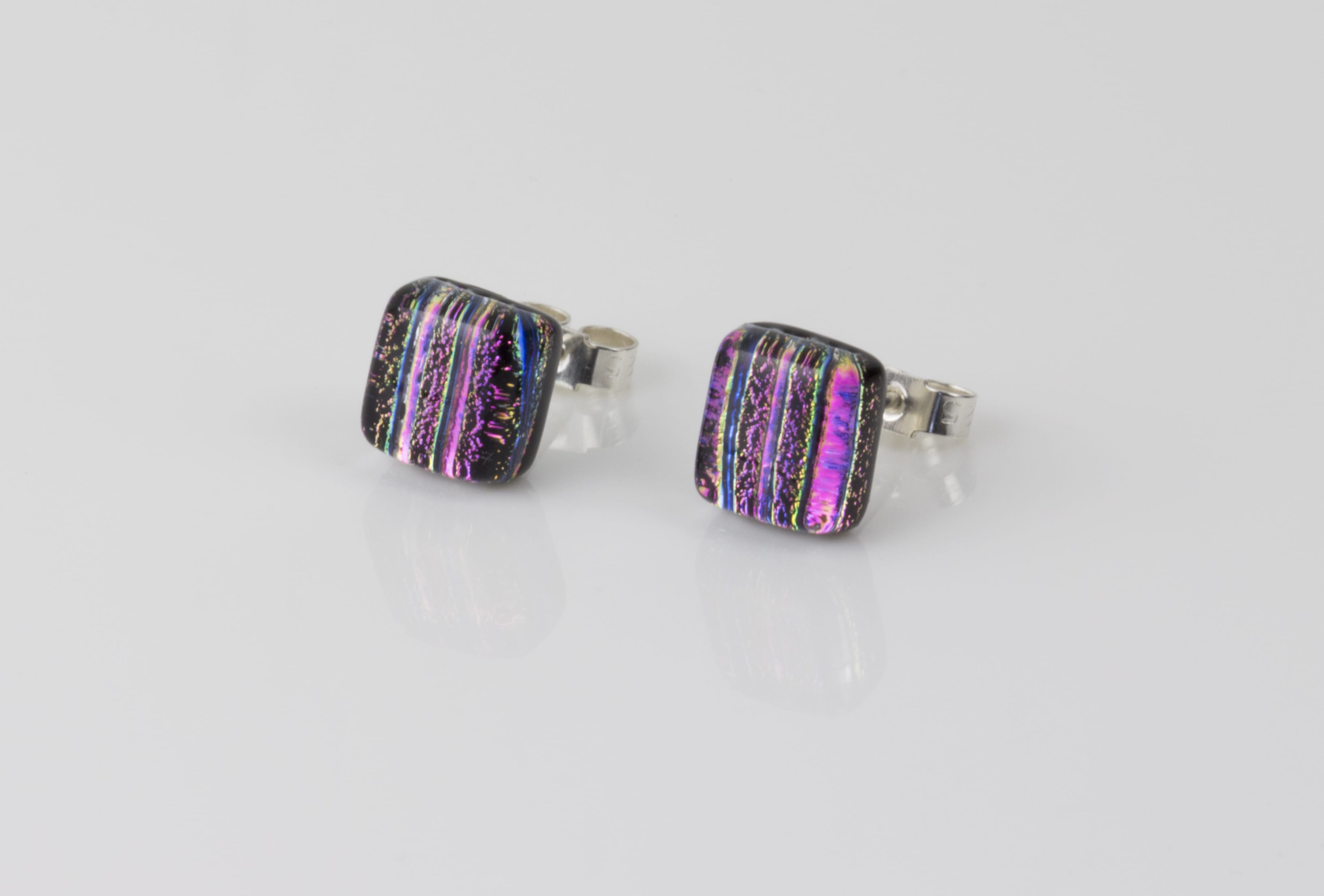 Dichroic glass jewellery uk, handmade stud earrings with striped pink, yellow, black, blue. Square, glass 8-10mm, sterling silver