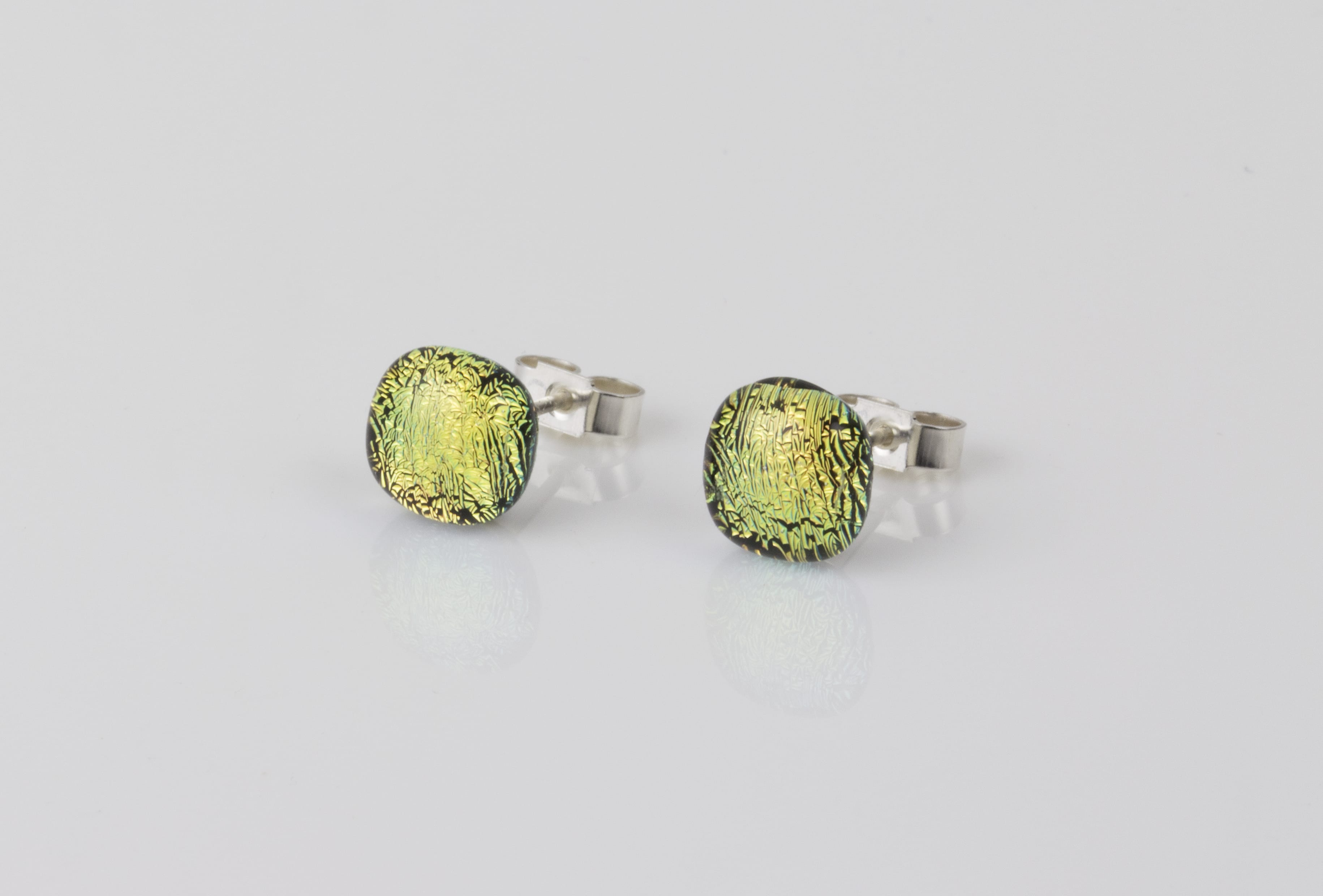 Dichroic glass jewellery uk, handmade stud earrings with salmon dichroic glass, round, sterling glass 7-9mm, silver posts.