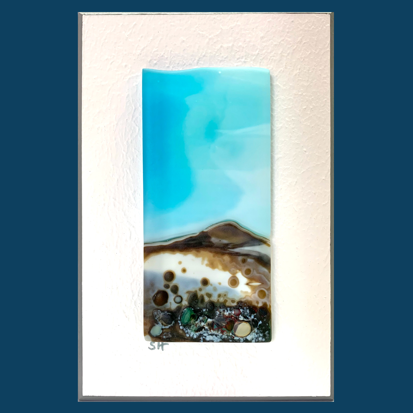Seascapes fused glass wall art - aquamarine moody sky, vanilla/teal greens/brown landscape.