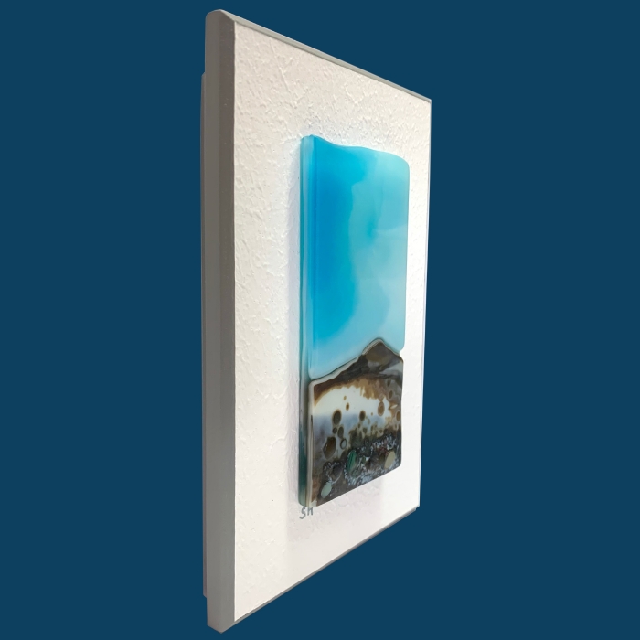 Seascapes fused glass wall art - aquamarine moody sky, vanilla/teal greens/brown landscape.